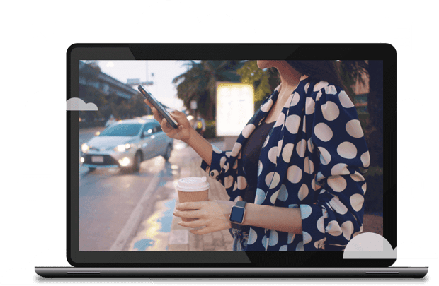 Vonage Communication APIs Laptop image with a still frame of a woman using a mobile app and laptop